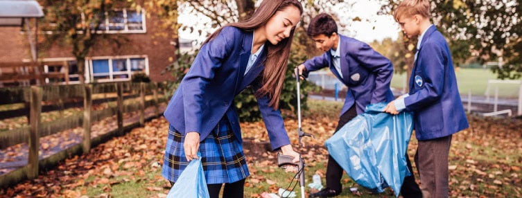 School children picking up litter