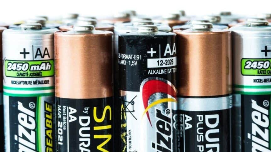 A row of used household batteries